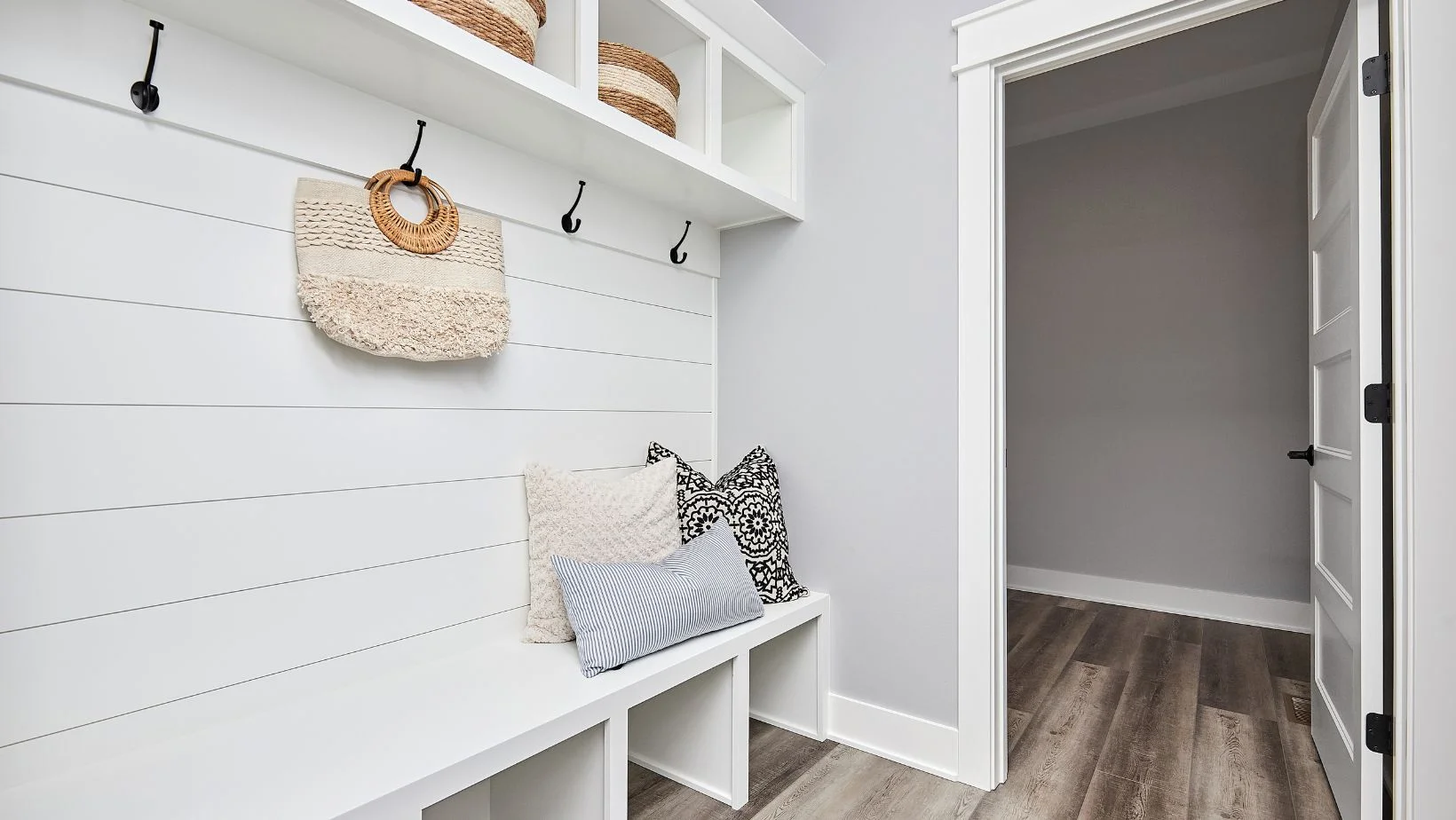 white entryway bench woth storage